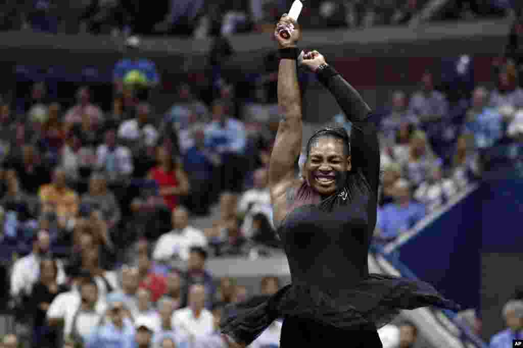 Serena Williams of the United States, celebrates after defeating Karolina Pliskova of the Czech Republic, 6-4, 6-3, during the quarterfinals of the U.S. Open tennis tournament in New York, Sept. 4, 2018.