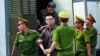 15 người đối mặt cáo buộc đánh bom sân bay Tân Sơn Nhất