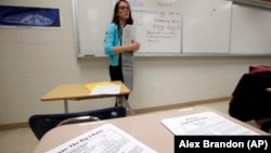 Katerina Maylock, with Capitals Educators, teaches a test preparation class at Holton Arms School in Bethesda, Maryland.