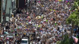 People take part in an All Black Lives Matter march, organized by Black LGBTQ+ leaders, in the aftermath of the death in Minneapolis police custody of George Floyd, in Hollywood, Los Angeles, California, U.S., June 14, 2020.