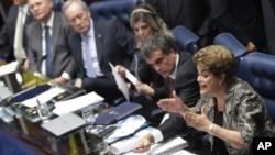 Brazil's suspended President Dilma Rousseff speaks at her own impeachment trial, in Brasilia, Brazil, Aug. 29, 2016. 