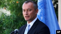 FILE - In a Monday, Sept. 25, 2017, photo, United Nations Special Coordinator for the Middle East Peace Process Nickolay Mladenov, attends a press conference at the UNSCO offices in Gaza City.