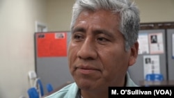 Samuel Santiago Santiago, a restaurant manager who studies part-time at the school inspired by Cesar Chavez, is a U.S. citizen but worries about relatives who are undocumented.