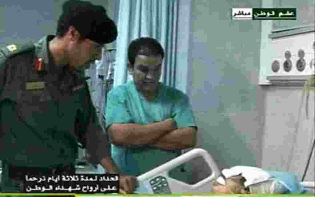 Imagen de video de la televisión estatal libia del 9 de agosto de 2011 que muestra a Khamis Gadhafi herido.