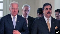 U.S. Vice President Joe Biden, left, met with Pakistani Prime Minister Yusuf Raza Gilani, right, for a meeting at the Prime Minister's residence in Islamabad, Pakistan, Jan. 12, 2011.