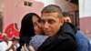 Released Palestinian prisoner Nehad Jondiya hugs his sister, after 24 years spent in an Israeli jail, at his family house in Gaza City, Aug 14, 2013. 