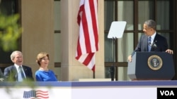 Former president George W. Bush, former first lady Laura Bush and President Obama share a lighter moment during the dedication of the Bush Presidential Library and Museum, April 25, 2013.