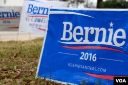 Signs stand in front of Bernie Sanders' campaign headquarters in Columbia, S.C. Sanders has mostly planned events outside the state prior to the Democratic primary on Saturday. (B. Allen/VOA)