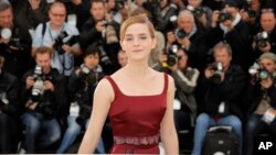 Actor Emma Watson poses for photographers during a photo call for the film The Bling Ring at the 66th international film festival, in Cannes, southern France, May 16, 2013.
