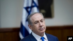 Israeli Prime Minister Benjamin Netanyahu attends the weekly cabinet meeting at his office in Jerusalem, Jan. 8, 2017. 