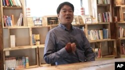 Lim KyoungJae, 46, head of the Seoul-based Miko Travel agency, speaks at his office in Seoul, South Korea, April 3, 2019. “If we use international age, things could get more complicated because it’s a society that cares so much about which year you were born,” said Lim.
