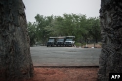 FILE - Game-viewing vehicles are parked and ready to take tourists through Yankari Game Reserve in the northeastern Nigeria, March 4, 2016.