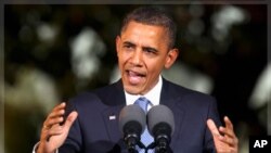 U.S. President Barack Obama speaks at his news conference at the conclusion of the APEC Summit in Honolulu, Hawaii November 13, 2011.