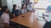 Photo from Facebook page of Center of Disease Control in Cambodia on Thursday March, 5th shows four people being questioned after coming in contact with a Japanese man reported to be tested positive for the novel coronavirus. 