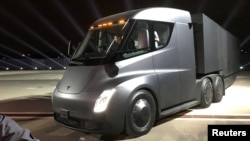 Tesla's new electric semitractor-trailer is unveiled during a presentation in Hawthorn, California, Nov. 16, 2017.
