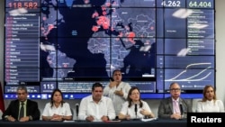 La ministre de la Santé du Panama (3e D), Rosario Turner, lors d'une conférence de presse pour annoncer le premier décès dû au coronavirus, Panama City, 10 mars 2020. (Reuters/Erick Marciscano)