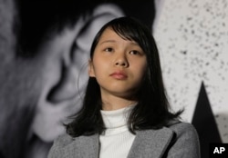 Agnes Chow, 21, a member of democracy activist Joshua Wong's Demosisto party, attends a protest in Hong Kong, Jan. 28, 2018.