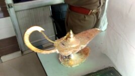 Genie usually live in lamps. But in this English expression, we say bottle. This photograph taken on October 29, 2020 shows a lamp which the owner claims had magic powers as described in the popular folk tale 