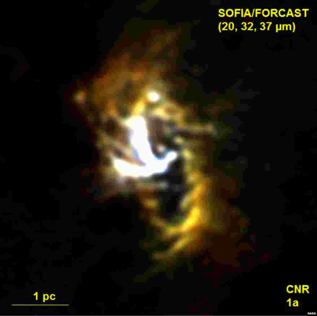Researchers using the Stratospheric Observatory for Infrared Astronomy (SOFIA) have captured new images of a ring of gas and dust seven light-years in diameter surrounding the supermassive black hole at the center of the Milky Way. (NASA/SOFIA/FORCAST tea