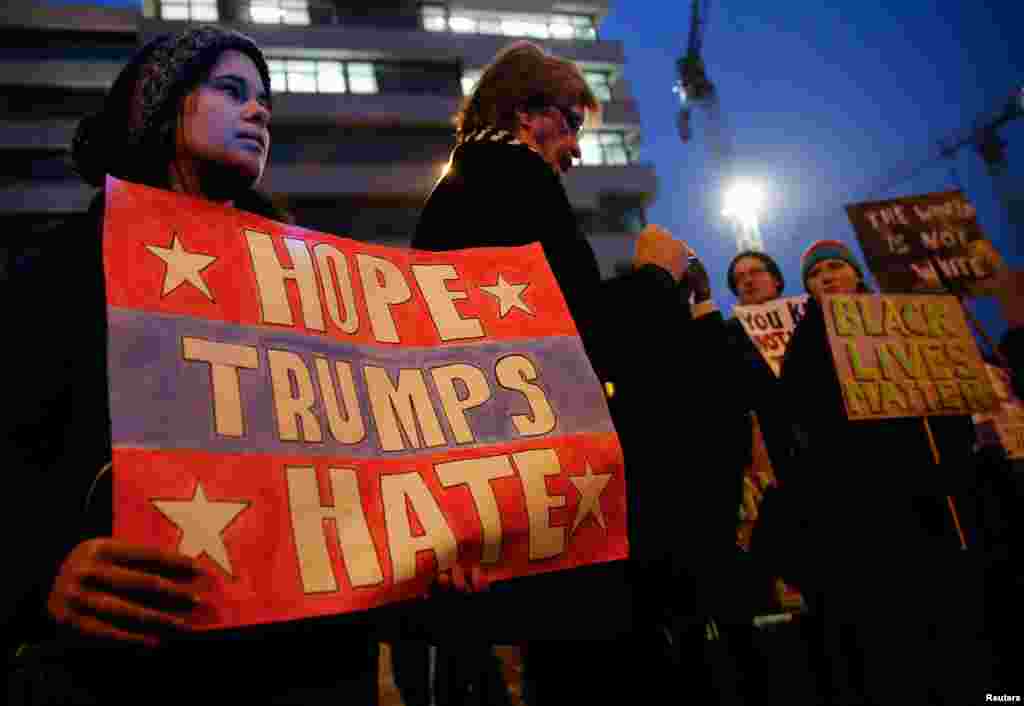 Anti-Trump protesters gather during a protest against the inauguration of U.S. President Donald Trump, in Berlin, Jan. 20, 2017.