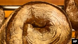 Bread made with beer from a brewery in Germany. The Fuechschen Brewery had many liters of unsold beer. Bakers took the beer to use in bread. (AP Photo/Daniel Niemann)