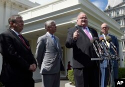 Rep. Billy Long, second from right, speaks to reporters outside the White House in Washington, May 3, 2017. From left are, Rep. Michael Burgess, Rep. Fred Upton, R-Mich., and Rep. Greg Walden.