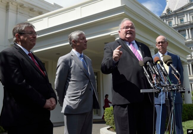 Rep. Billy Long, second from right, speaks to reporters outside the White House in Washington, May 3, 2017. From left are, Rep. Michael Burgess, Rep. Fred Upton, R-Mich., and Rep. Greg Walden.