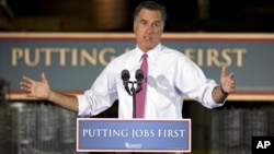 Republican presidential candidate, former Massachusetts Gov. Mitt Romney gestures during a campaign stop at Seilkop Industries in Cincinnati, Ohio, Thursday, June 14, 2012.