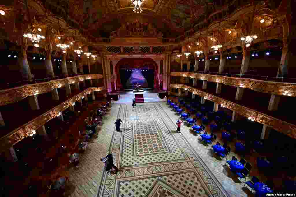 People dance in the Blackpool Tower Ballroom in Blackpool, England, after it was restored for its yearly re-opening today.