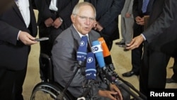 Germany's Finance Minister Wolfgang Schaeuble talks to the media before attending a eurozone finance ministers meeting in Luxembourg, June 21, 2012. 