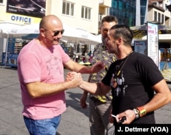 Well-wishers urge Davor Dragicevic to remain strong, in Banja Luka, Bosnia. His nightly protest vigils are attracting crowds and scaring Milorad Dodik, president of Republika Srpska, the largely autonomous Serb-controlled mini-state within Bosnia and Herzegovina.