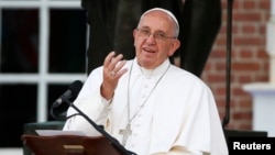 FILE - Pope Francis delivers remarks in front of Independence Hall in Philadelphia, Sept. 26, 2015. 