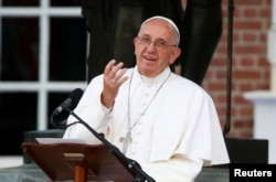 FILE - Pope Francis delivers remarks in front of Independence Hall in Philadelphia.
