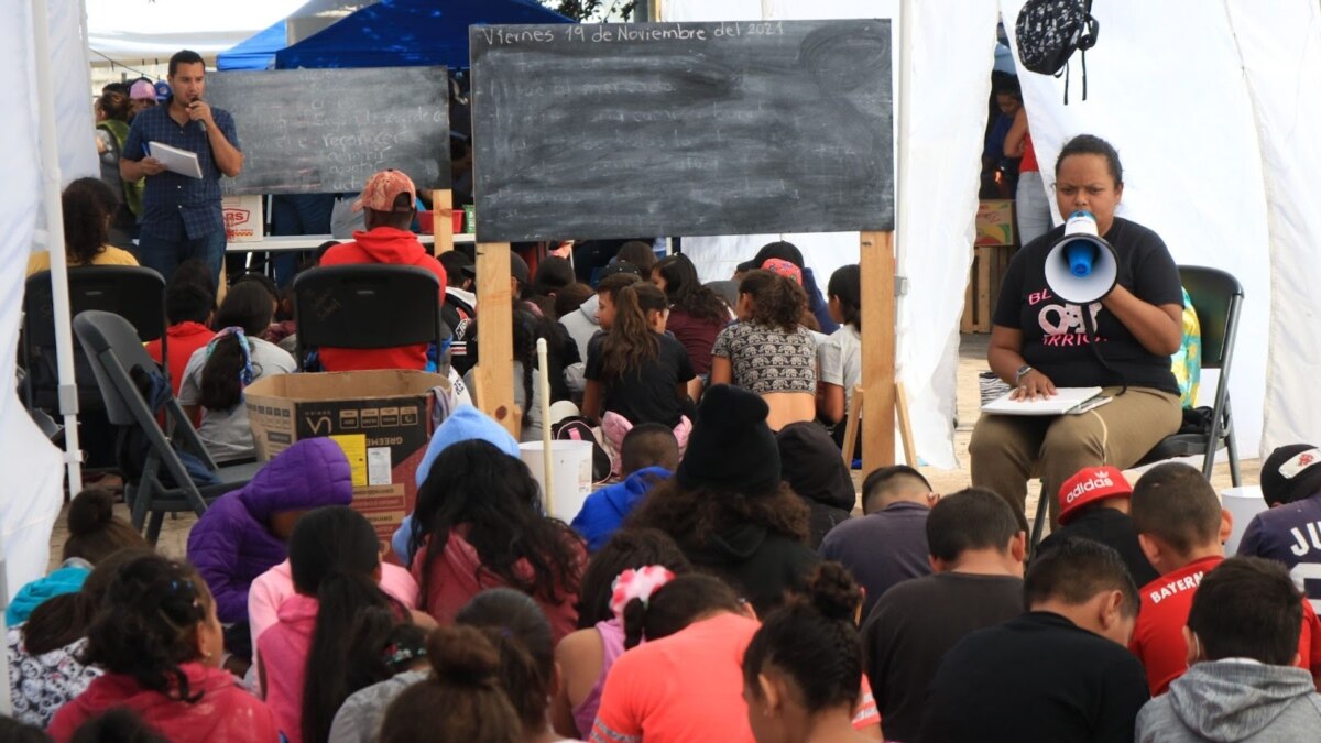 Migrants At US-Mexico Border Run Makeshift School For Stranded Children