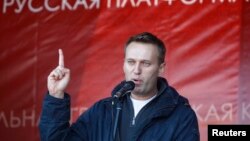 Russian lawyer and blogger Alexei Navalny attends a rally in Moscow, October 22, 2011.