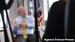 FILE - Special Inspector General for Afghanistan Reconstruction John Sopko speaks during an interview at his office in Arlington, Virginia, July 24, 2014. 