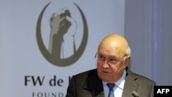 Former South African president FW de Klerk delivers a speech to mark 20 years of democracy, on January 31, 2014 in Cape Town. South Africa's last white president took a swipe at the ruling African National Congress on January 31, 2014, saying they discri