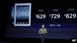 Apple's senior vice president of Worldwide Marketing Phil Schiller discusses the prices of the new iPad during an event in San Francisco, March 7, 2012.