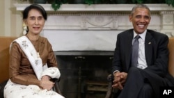 Presiden AS Barack Obama (kanan) menerima kunjungan pemimpin Myanmar Aung San Suu Kyi di Gedung Putih hari Rabu (14/9).