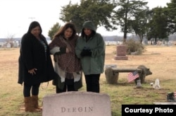 Gudrun Drofn Emilsdattir, right, sister Kimberly Lineberger, center, and newly-discovered cousin Shelby Foster visiting the Oklahoma cemetery where their ancestors are buried.