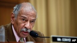 FILE- Rep. John Conyers, D-Mich., speaks during a hearing of the House Judiciary subcommittee on Capitol Hill in Washington, April 4, 2017.