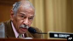 FILE- Rep. John Conyers, D-Mich., speaks during a hearing of the House Judiciary subcommittee on Capitol Hill in Washington, April 4, 2017.