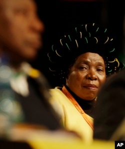 FILE - Former African Union Chairperson, Nkosazana Dlamini-Zuma, looks toward deputy President Cyril Ramaphosa, during their policy conference in Johannesburg, South Africa, July 5, 2017.