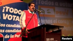 Venezuela's President Nicolas Maduro speaks during a rally with candidates of United Socialist Party (PSUV) in Caracas, June 22, 2015, in this handout picture.