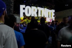 FILE - The Fortnite booth is shown at a video game industry convention in Los Angeles, California, June 12, 2018.