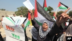 A Palestinian woman shouts slogans during a rally in support of President Mahmoud Abbas' bid for statehood recognition at the United Nations, in Gaza City September 22, 2011.