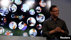 Amit Singhal, senior vice president of search at Google, speaks at the garage where the company was founded on Google's 15th anniversary in Menlo Park, California Sep. 26, 2013. 