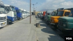 In this photo sent to VOA Persian, Iranian trucks idled by a 4-day-old truckers strike can be seen in the northern province of Qazvin, Sept. 26, 2018. (VOA)