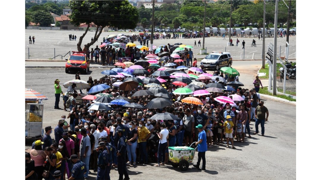 Hundreds of fans of Brazilian singer Marilia Mendonca, 26, line up outside the Arena Goiania sports center to attend her wake, in Goiania, state of Goias, Brazil, on Nov. 6, 2021.