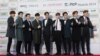 South Korean K-Pop group EXO poses prior to the K-POP Awards 2014 in Seoul, South Korea, Wednesday, Jan. 28, 2015. (AP Photo/Ahn Young-joon)